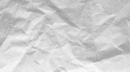 Fotobehang Pop Art Halftone crumpled paper texture with black a dotted, rough, and wrinkled surface. Wite creased sheet background in comic pop-art style, featuring grainy folds and gritty distressed details.  © Maryna