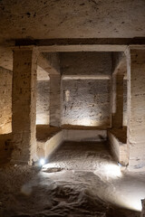 Burial niches along a wall of the Catacombs of Kom el Shoqafa in Alexandria, Egypt