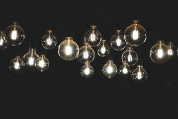 Glowing vintage edison style light bulbs create a captivating illuminated decorative array.