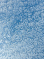 blue sky with clouds. Nature Background. White cumulus clouds formation in blue sky. Blue sky and white clouds background