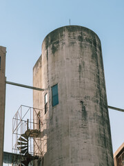 Weathered Industrial Silo with Spiral Staircase