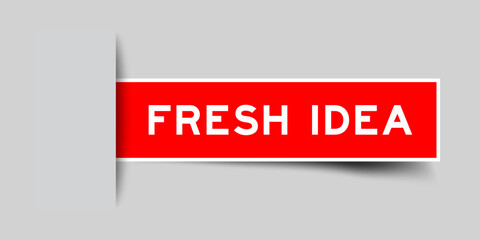 Red color square shape sticker label with word fresh idea inserted in gray background
