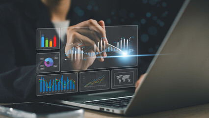 A hand analyzing interactive financial and marketing charts on a digital dashboard, showcasing business strategy, data reports, and statistics.