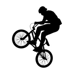 Obraz premium Extreme BMX Bicycle Rider Performing Aerial Silhouette Trick.