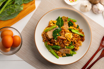 Stir fried Rice Noodles(flat noodle) with Soy Sauce egg and Pork,Pad See Ew.Top view.