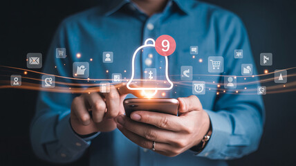 Person using smartphone with notification bell icon