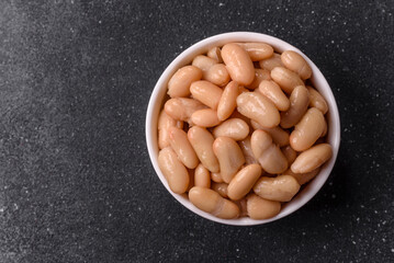 Canned white beans, prepared as an ingredient for a classic English breakfast. Canned beans