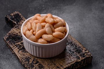 Canned white beans, prepared as an ingredient for a classic English breakfast. Canned beans