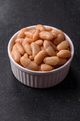 Canned white beans, prepared as an ingredient for a classic English breakfast. Canned beans
