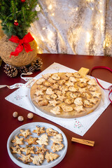 Home baked crackers cut in heart, star and Christmas tree shapes for a Christmas meal
