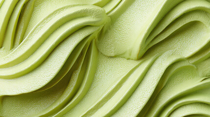 Close-up view of a matcha ice cream swirl, showcasing its smooth texture and vibrant green color. The perfect visual for food enthusiasts 