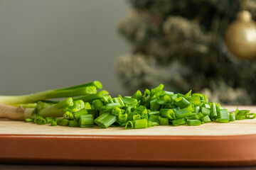 Sliced Fresh Green Onion on Wooden Cutting Board
