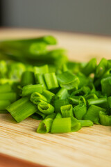 Sliced Fresh Green Onion on Wooden Cutting Board