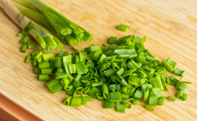 Sliced Fresh Green Onion on Wooden Cutting Board
