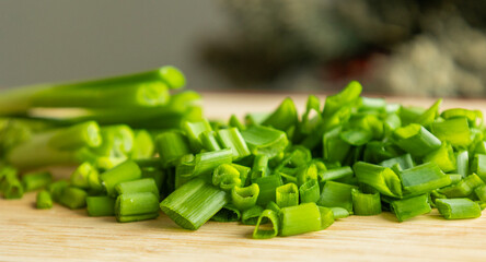 Sliced Fresh Green Onion on Wooden Cutting Board