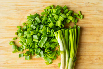 Sliced Fresh Green Onion on Wooden Cutting Board