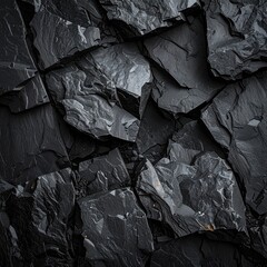 Close-up view of dark, broken slate rock