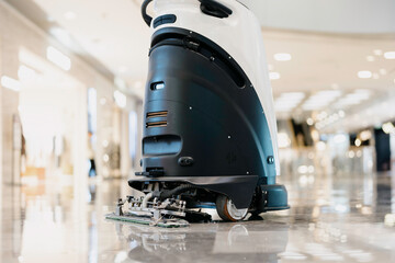 The robot vacuum is working in the mall.