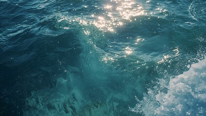 Fototapeta premium A serene ocean scene with sparkling sunlight reflecting on the surface of the water creating a beautiful play of light and color