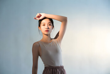 asian woman portrait solid color background