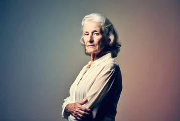 Senior woman portrait solid color background