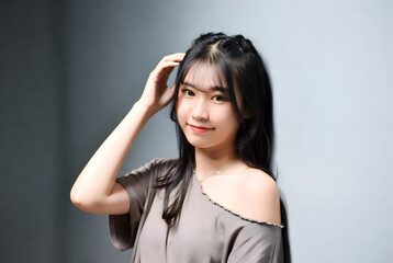 asian woman portrait solid color background