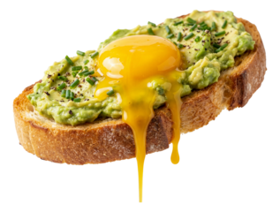 Egg yolk breaking over avocado toast, with yolk drizzling over the edge.