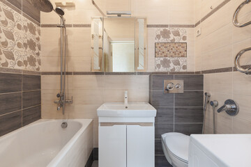 modern bathroom room with toilet and washing machine