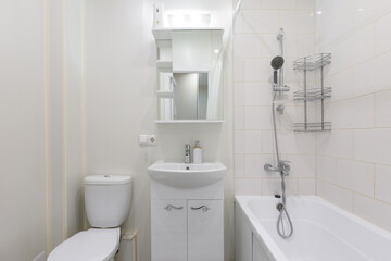 modern bathroom room with toilet and washing machine