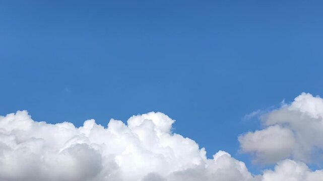 A grayish cumulonimbus cloud is forming in the lower part of the sky