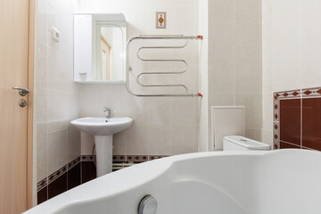 modern bathroom room with toilet and washing machine