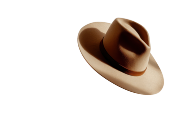 Wide brim hat placed at an angle casting a soft shadow on transparent background