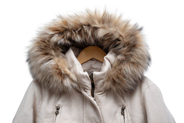 Winter coat on hanger with fur hood spread out on transparent background