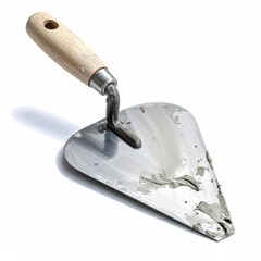 Close-up of a trowel tool with wood handle, holding mortar, shadow