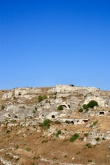 Fototapeta premium Matera, Italy - 12 August 2025: Matera historic cityscape and streets