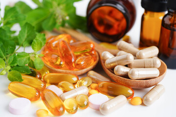 Alternative medicine herbal organic capsule with vitamin E omega 3 fish oil, mineral, drug with...