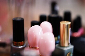 Nail polish bottles close-up macro background