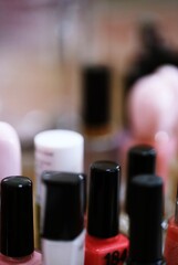 Nail polish bottles close-up macro background