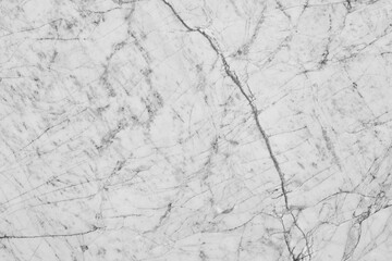 Clean white marble stone texture with sharp branch-like black veins and a fractured natural pattern, perfect for minimalist interior design and high-end bathroom surfaces.