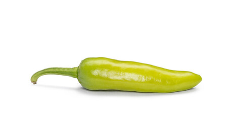 Ripe green banana pepper lying horizontally, ready for cooking and ingredients