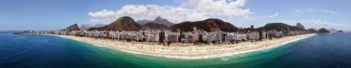 Rio de Janeiro, Brazil, aerial view panorama of Copacabana Beach, Ipanema, the city skyline with the rocky hills full of vegetation, Copacabana Fort, Avenida Atlantica (Atlantic Avenue)