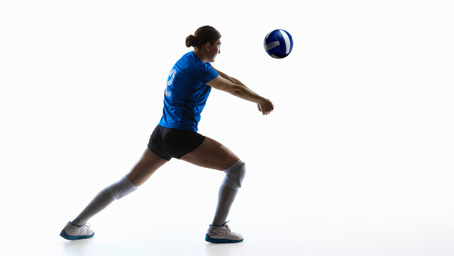 Volleyball athlete performing side-stance forearm pass for digital analytics layouts. Concept of skill-tracking dashboards, UX mockups, AI training models, AR motion guides and sports platforms. - Powered by Adobe
