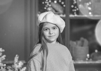 Black and white banner wiht a portrait of a cute girl in a white beret. Child psychology. Children are waiting for the holidays. Childhood concept.