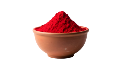 Vibrant red powder in terracotta bowl on black background