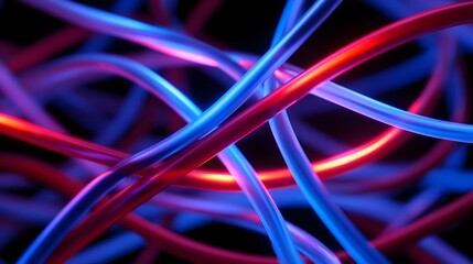 A close up abstract view of tangled blue and red neon fiber optic cables glowing against a dark background