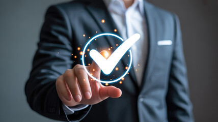 Businessman interacting with glowing checkmark interface