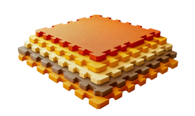 a set of orange and yellow interlocking puzzle tiles on a white background, isolated at the edges. the top view shows all four sides of each tile, emphasizing their rectangular shape with rounded corn