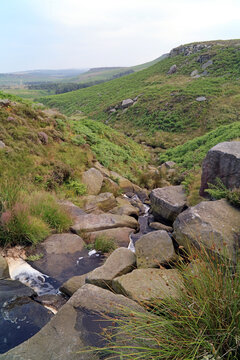 View of a small waterfall below Upper Burbage Bridge, Derbyshire England
