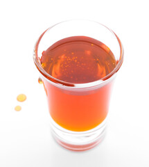 glass of Honey isolated on white background.