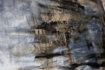 Abstract painting on canvas close-up. Paint drips.